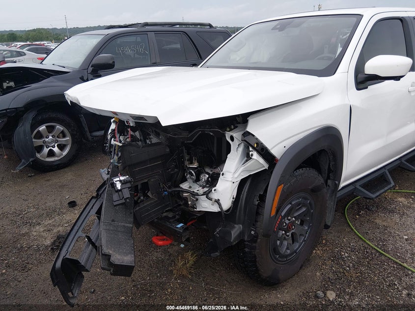 2025 Nissan Navara (frontier) VIN 1N6ED1EJ9SN623251 IAAI salvage auction — FRONT END, Wait Title, sold $7,400 on 2026-10-13 (photo 6)