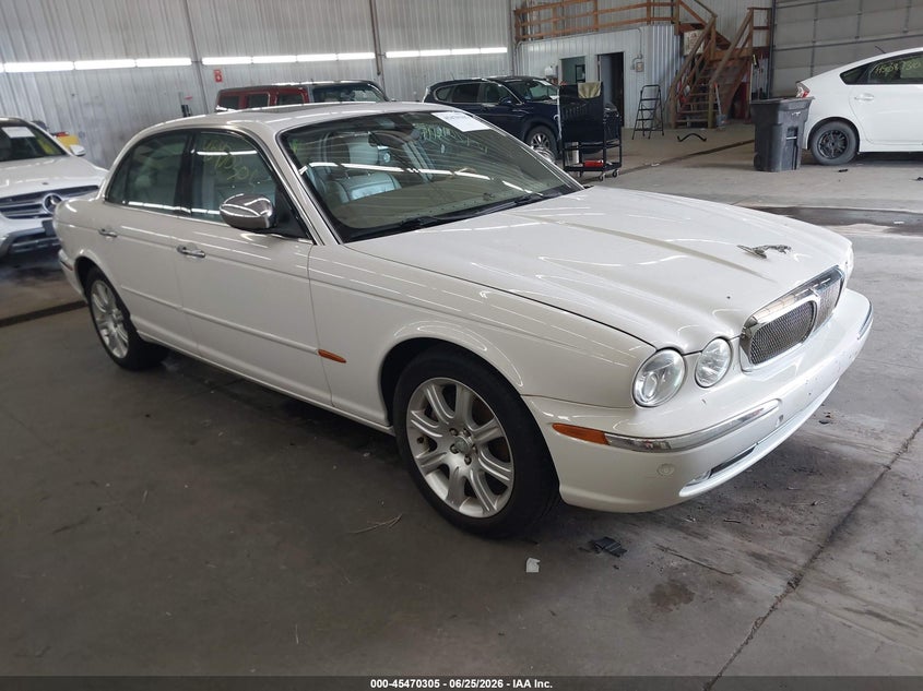 2004 Jaguar Xj series VIN SAJWA74C84SG16743 IAAI salvage auction — NORMAL WEAR, Clear (Florida), sold $350 on 2026-07-07 (photo 1)