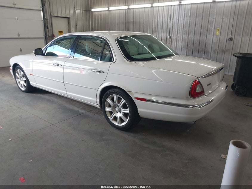 2004 Jaguar Xj series VIN SAJWA74C84SG16743 IAAI salvage auction — NORMAL WEAR, Clear (Florida), sold $350 on 2026-07-07 (photo 3)