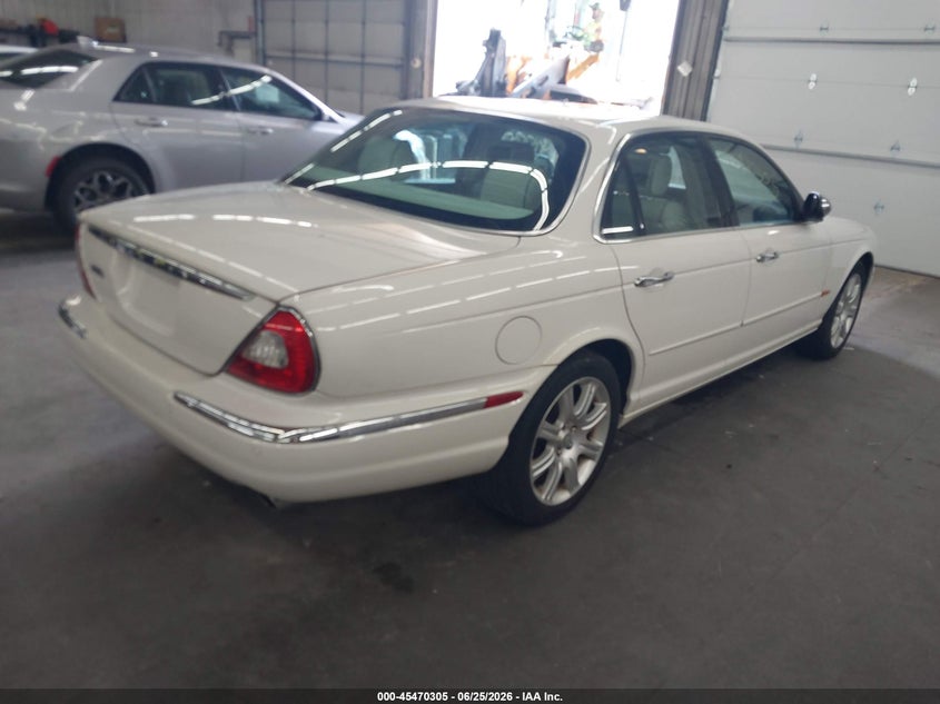2004 Jaguar Xj series VIN SAJWA74C84SG16743 IAAI salvage auction — NORMAL WEAR, Clear (Florida), sold $350 on 2026-07-07 (photo 4)
