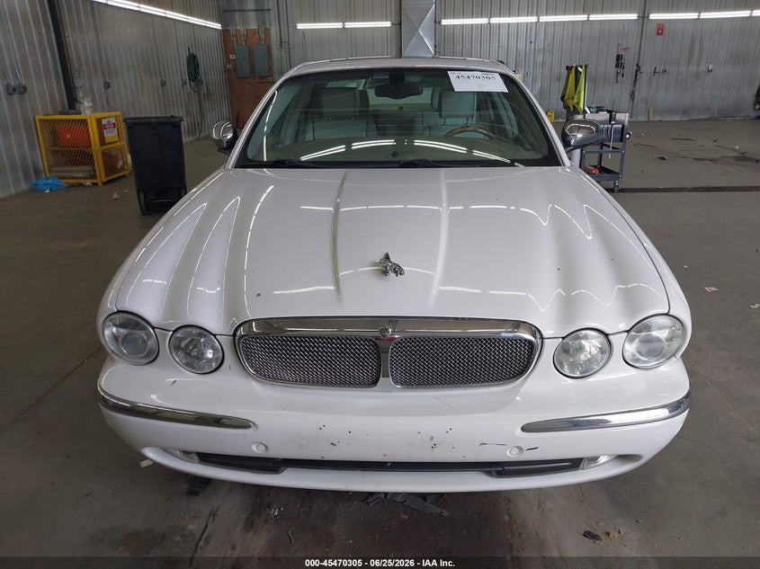 2004 Jaguar Xj series VIN SAJWA74C84SG16743 IAAI salvage auction — NORMAL WEAR, Clear (Florida), sold $350 on 2026-07-07 (photo 6)