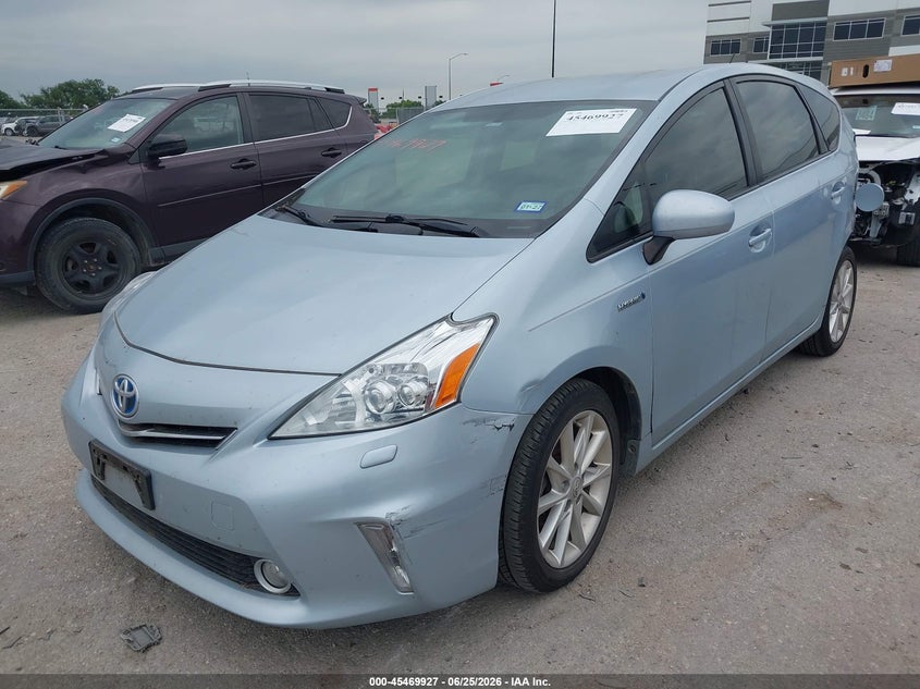2014 Toyota Prius v VIN JTDZN3EU2E3316642 IAAI salvage auction — NORMAL WEAR, Clear (Montana), sold $25 on 2026-07-21 (photo 2)