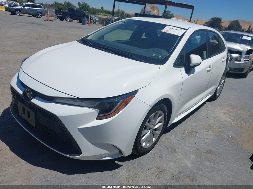 2022 Toyota Corolla VIN JTDVPMAE9N3031434 IAAI salvage auction — SIDE, Salvage (California), sold $4,350 on 2026-07-23 (photo 2)