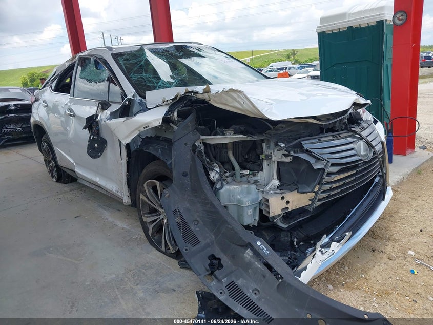 2016 Lexus VIN 2T2ZZMCA1GC023713 IAAI salvage auction — ROLLOVER, Salvage Title, sold $4,550 on 2026-07-23 (photo 1)