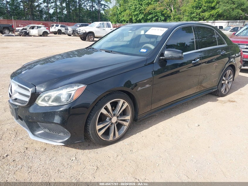 2014 Mercedes-benz E-klasse VIN WDDHF5KB4EA874517 IAAI salvage auction — SIDE, Original (Texas), sold $2,800 on 2026-08-20 (photo 2)