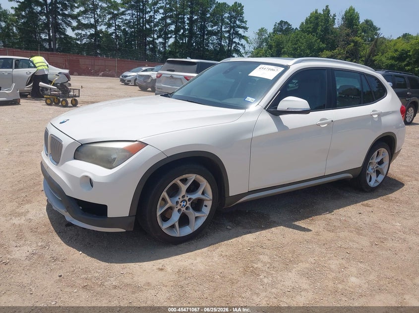2015 BMW X1 VIN WBAVM1C50FV318992 IAAI salvage auction — NORMAL WEAR, Original (Texas), sold $1,100 on 2026-07-23 (photo 2)