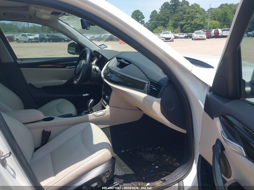 2015 BMW X1 VIN WBAVM1C50FV318992 IAAI salvage auction — NORMAL WEAR, Original (Texas), sold $1,100 on 2026-07-23 (photo 5)