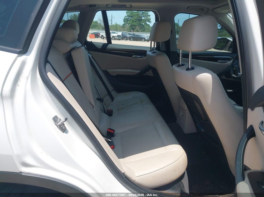 2015 BMW X1 VIN WBAVM1C50FV318992 IAAI salvage auction — NORMAL WEAR, Original (Texas), sold $1,100 on 2026-07-23 (photo 8)