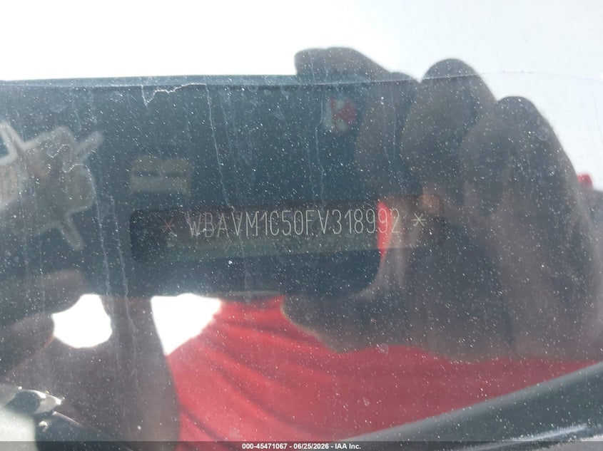 2015 BMW X1 VIN WBAVM1C50FV318992 IAAI salvage auction — NORMAL WEAR, Original (Texas), sold $1,100 on 2026-07-23 (photo 9)