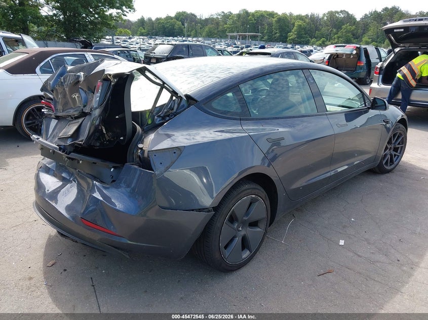 2023 Tesla Model 3 VIN 5YJ3E1EA8PF425872 IAAI salvage auction — REAR END, Mv-907A (New York), sold $5,400 on 2026-07-28 (photo 4)