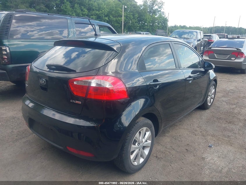 2014 Kia Rio VIN KNADN5A37E6415858 IAAI salvage auction — NORMAL WEAR, Clear (Maryland), sold $400 on 2026-07-22 (photo 4)