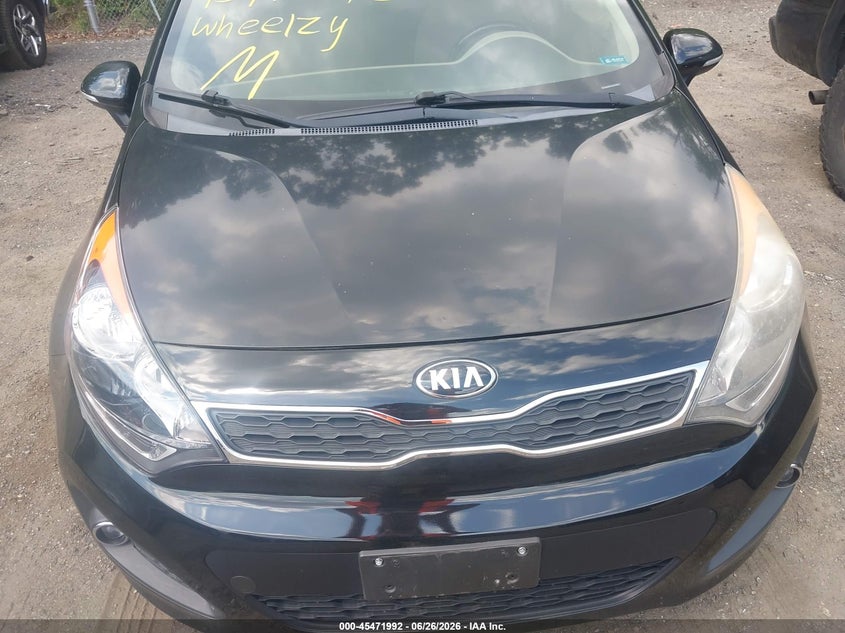 2014 Kia Rio VIN KNADN5A37E6415858 IAAI salvage auction — NORMAL WEAR, Clear (Maryland), sold $400 on 2026-07-22 (photo 6)