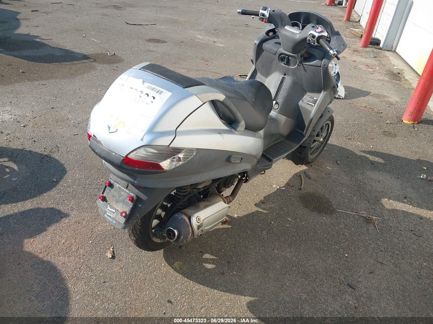 2007 Piaggio Mp3 VIN ZAPM479M275001666 IAAI salvage auction — NORMAL WEAR, Clear (New York), sold $25 on 2026-07-21 (photo 4)