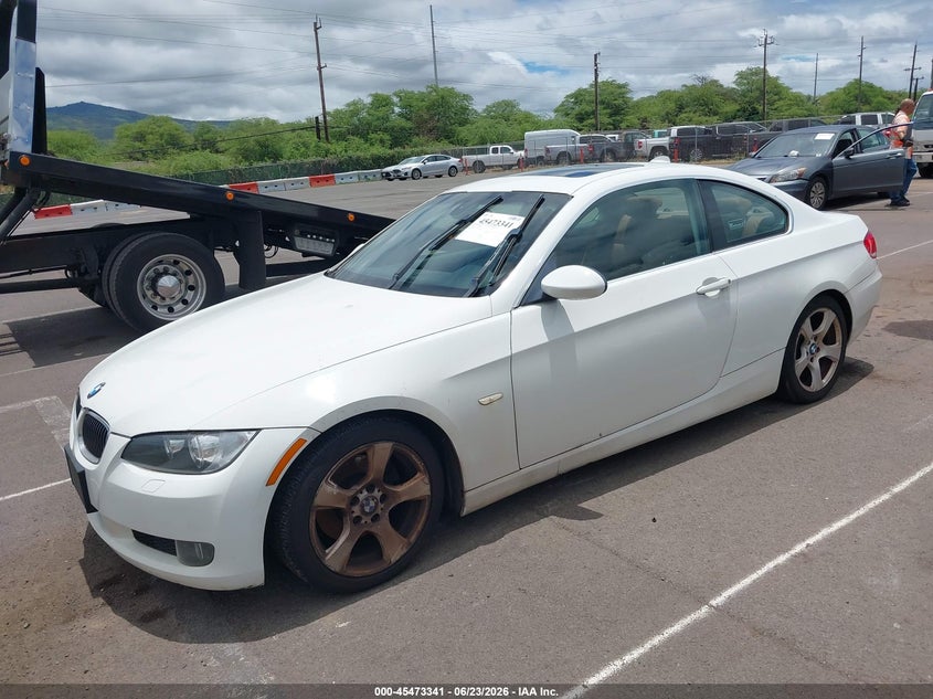 2009 BMW 3 series VIN WBAWB33569P138110 IAAI salvage auction — NORMAL WEAR, Clear (Hawaii), sold $100 on 2026-07-21 (photo 2)