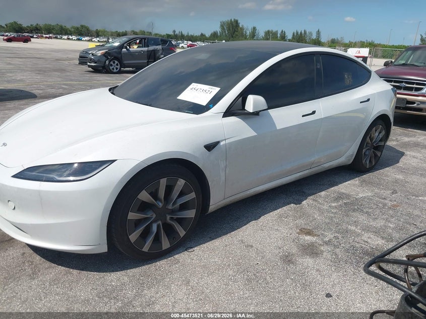 2025 Tesla Model 3 VIN 5YJ3E1EA1SF936526 IAAI salvage auction — NORMAL WEAR, Salvage Title, sold $12,100 on 2026-07-23 (photo 2)