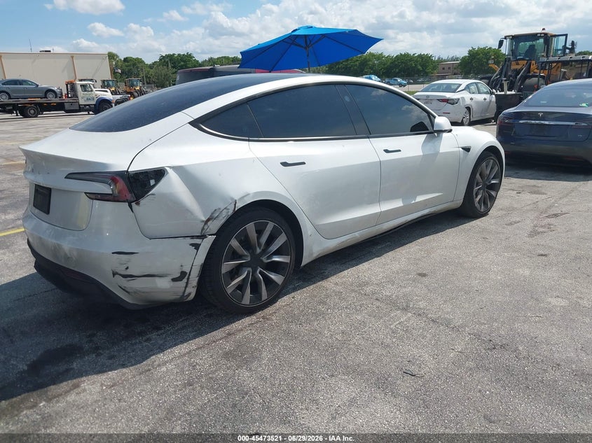 2025 Tesla Model 3 VIN 5YJ3E1EA1SF936526 IAAI salvage auction — NORMAL WEAR, Salvage Title, sold $12,100 on 2026-07-23 (photo 4)
