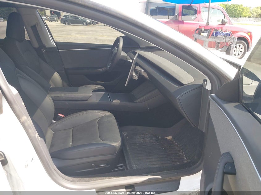 2025 Tesla Model 3 VIN 5YJ3E1EA1SF936526 IAAI salvage auction — NORMAL WEAR, Salvage Title, sold $12,100 on 2026-07-23 (photo 5)
