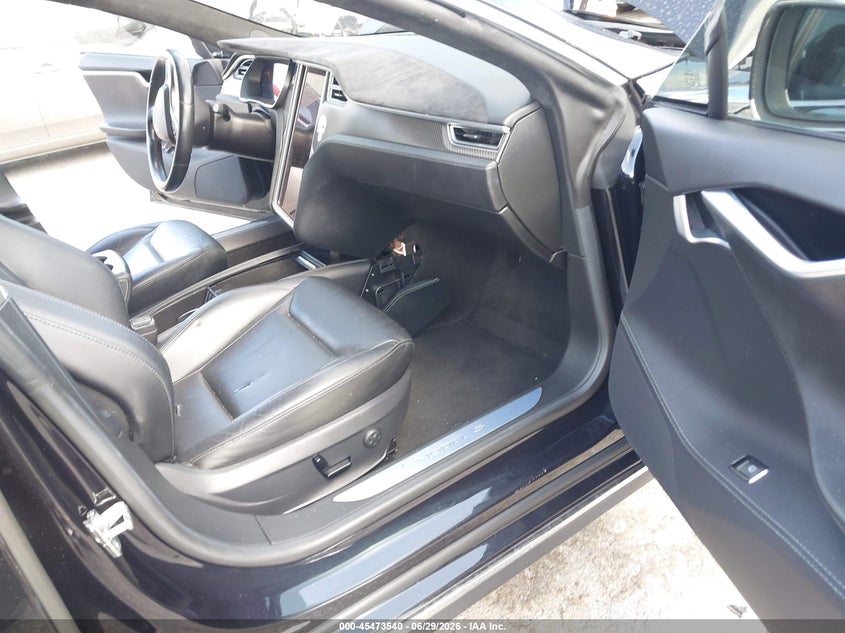 2015 Tesla Model s VIN 5YJSA1H44FF097720 IAAI salvage auction — NORMAL WEAR, Clear (Florida), sold $2,500 on 2026-07-29 (photo 5)