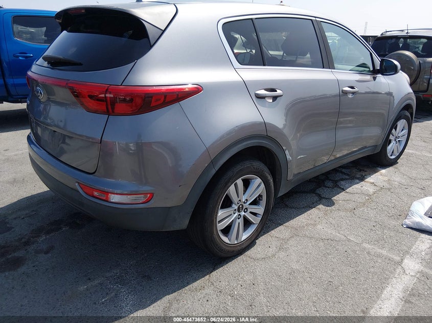 2019 Kia Sportage VIN KNDPM3AC0K7505849 IAAI salvage auction — THEFT, Salvage Title, sold $25 on 2026-07-23 (photo 4)