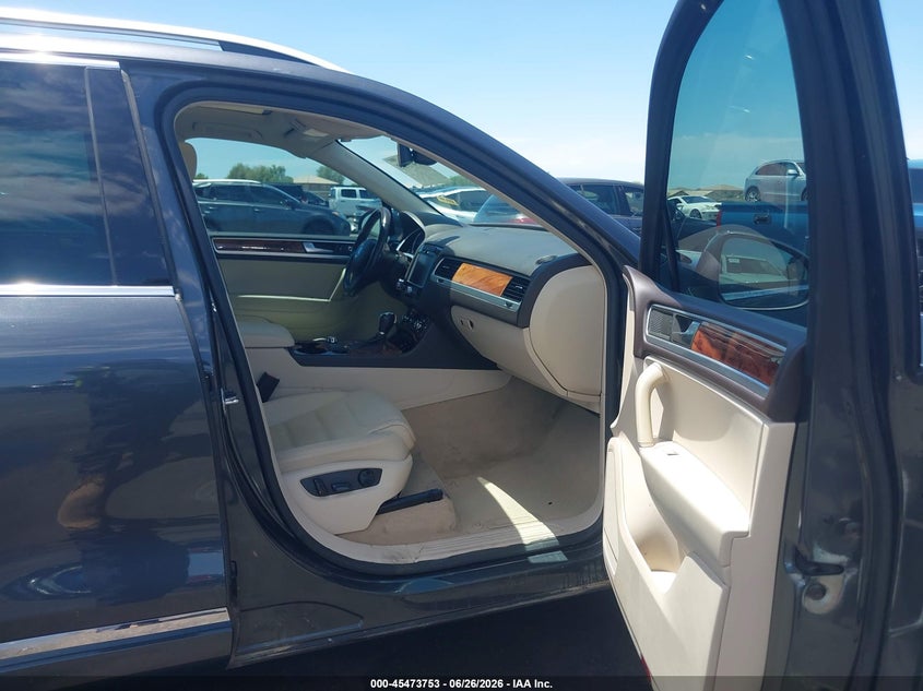 2011 Volkswagen Touareg VIN WVGFK9BP6BD004032 IAAI salvage auction — FRONT END, Salvage (Arizona), sold $3,150 on 2026-07-14 (photo 5)