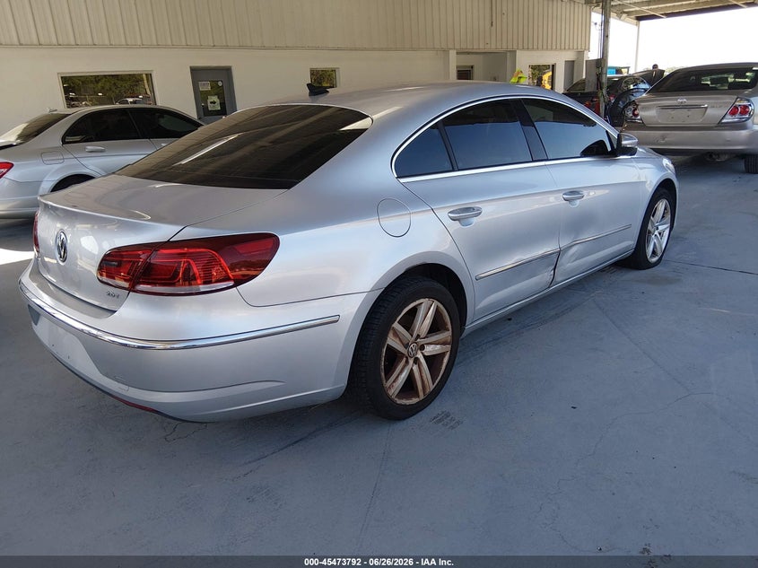 2014 Volkswagen Passat cc VIN WVWAN7AN6EE500375 IAAI salvage auction — ENGINE DAMAGE, Clear (Florida), sold $375 on 2026-07-08 (photo 4)