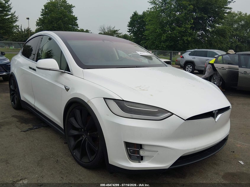 2017 Tesla Model x VIN 5YJXCBE20HF049952 IAAI salvage auction — SIDE, Clear (Montana), sold $4,050 on 2026-07-30 (photo 1)