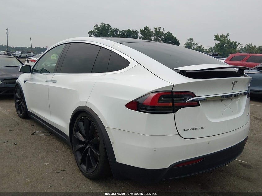 2017 Tesla Model x VIN 5YJXCBE20HF049952 IAAI salvage auction — SIDE, Clear (Montana), sold $4,050 on 2026-07-30 (photo 3)