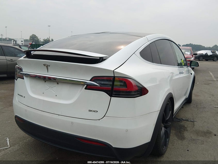 2017 Tesla Model x VIN 5YJXCBE20HF049952 IAAI salvage auction — SIDE, Clear (Montana), sold $4,050 on 2026-07-30 (photo 4)