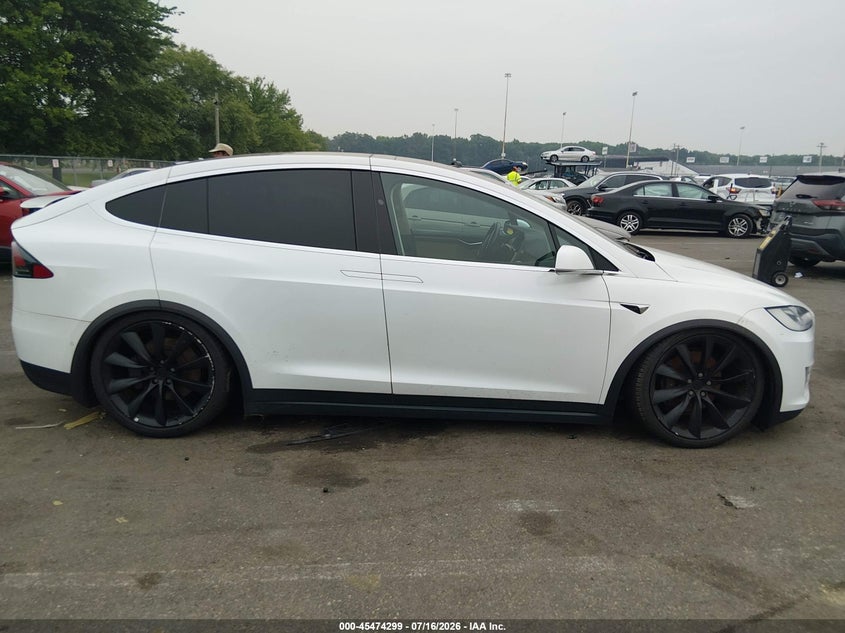 2017 Tesla Model x VIN 5YJXCBE20HF049952 IAAI salvage auction — SIDE, Clear (Montana), sold $4,050 on 2026-07-30 (photo 6)