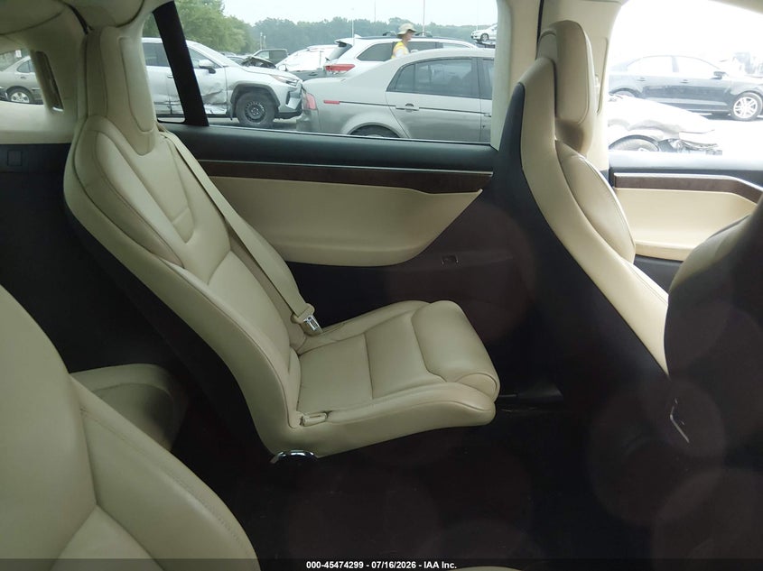 2017 Tesla Model x VIN 5YJXCBE20HF049952 IAAI salvage auction — SIDE, Clear (Montana), sold $4,050 on 2026-07-30 (photo 8)