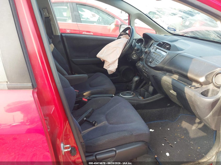 2012 Honda Fit VIN JHMGE8H51CC019463 IAAI salvage auction — NORMAL WEAR, Original (Texas), sold $600 on 2026-07-29 (photo 5)