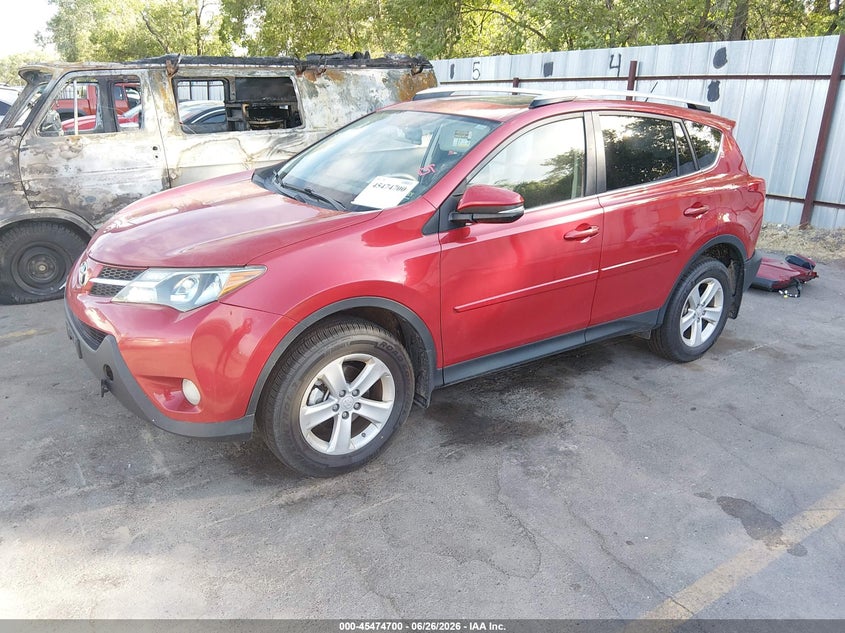 2014 Toyota Rav 4 VIN JTMRFREV9ED083801 IAAI salvage auction — SIDE, Salvage (Utah), sold $3,750 on 2026-07-30 (photo 2)
