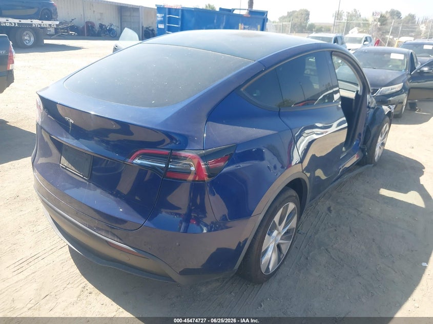 2020 Tesla Model y VIN 5YJYGDEE1LF057906 IAAI salvage auction — SIDE, Salvage (California), sold $6,900 on 2026-07-16 (photo 4)