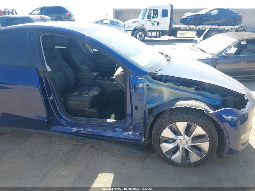 2020 Tesla Model y VIN 5YJYGDEE1LF057906 IAAI salvage auction — SIDE, Salvage (California), sold $6,900 on 2026-07-16 (photo 6)