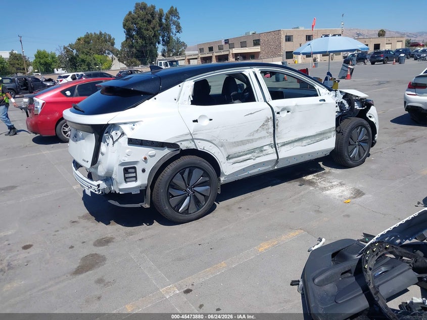 2025 Nissan Ariya VIN JN8BF0BE1SM462308 IAAI salvage auction — SIDE, Salvage (California), sold $10,500 on 2026-08-16 (photo 4)