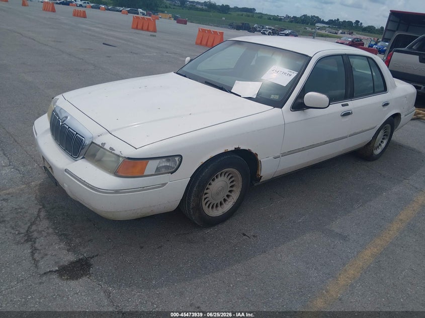 1998 Mercury Grand marquis VIN 2MEFM75W1WX677359 IAAI salvage auction — NORMAL WEAR, Clear (Missouri), sold $375 on 2026-07-09 (photo 2)