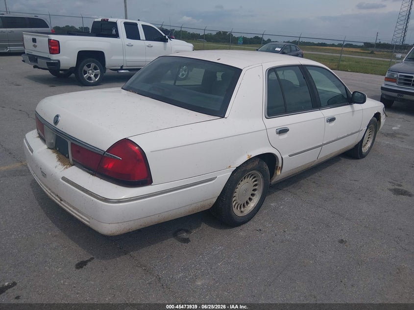 1998 Mercury Grand marquis VIN 2MEFM75W1WX677359 IAAI salvage auction — NORMAL WEAR, Clear (Missouri), sold $375 on 2026-07-09 (photo 4)