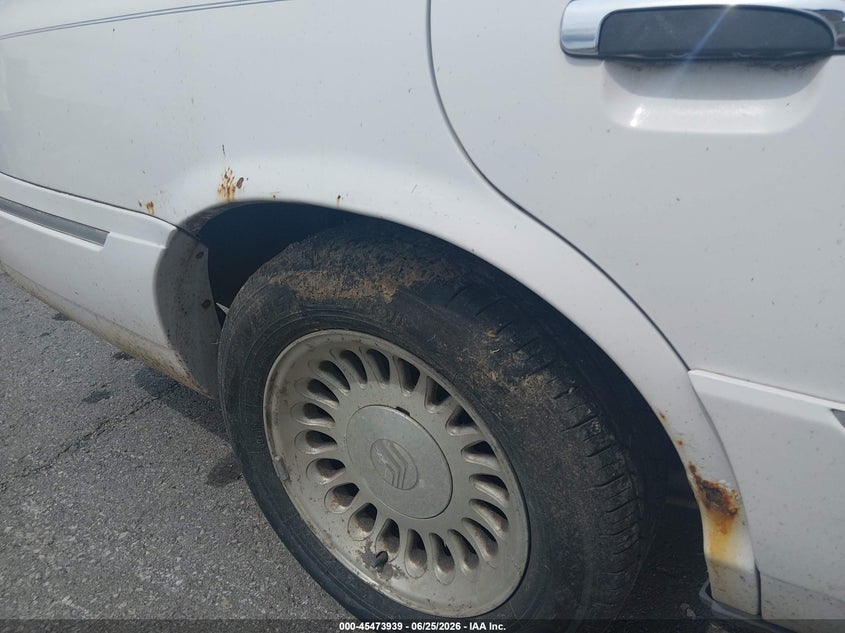 1998 Mercury Grand marquis VIN 2MEFM75W1WX677359 IAAI salvage auction — NORMAL WEAR, Clear (Missouri), sold $375 on 2026-07-09 (photo 6)