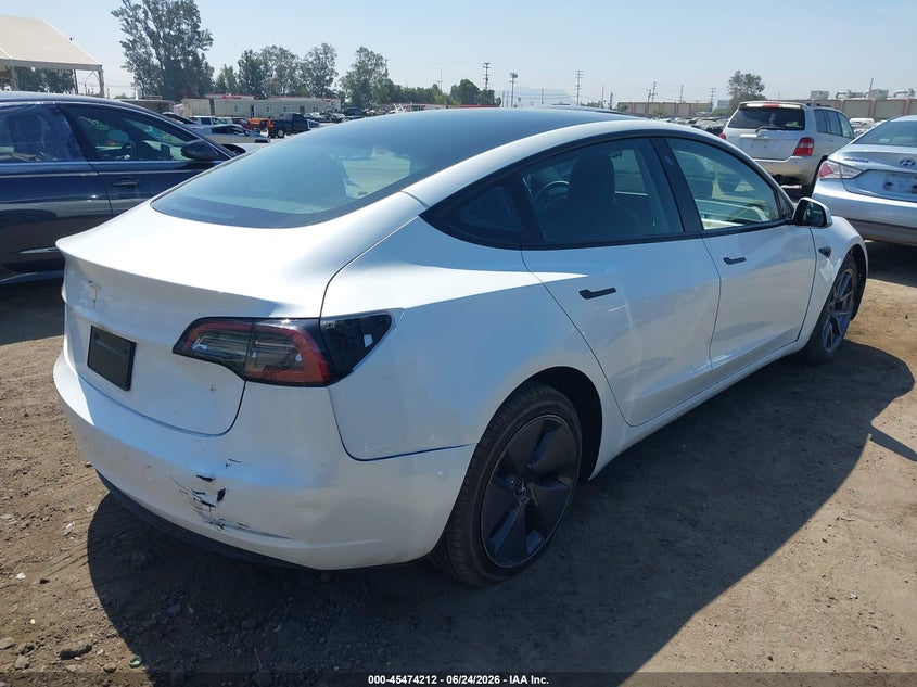 2023 Tesla Model 3 VIN 5YJ3E1EA1PF580862 IAAI salvage auction — REAR END, Salvage (California), sold $8,850 on 2026-07-15 (photo 4)