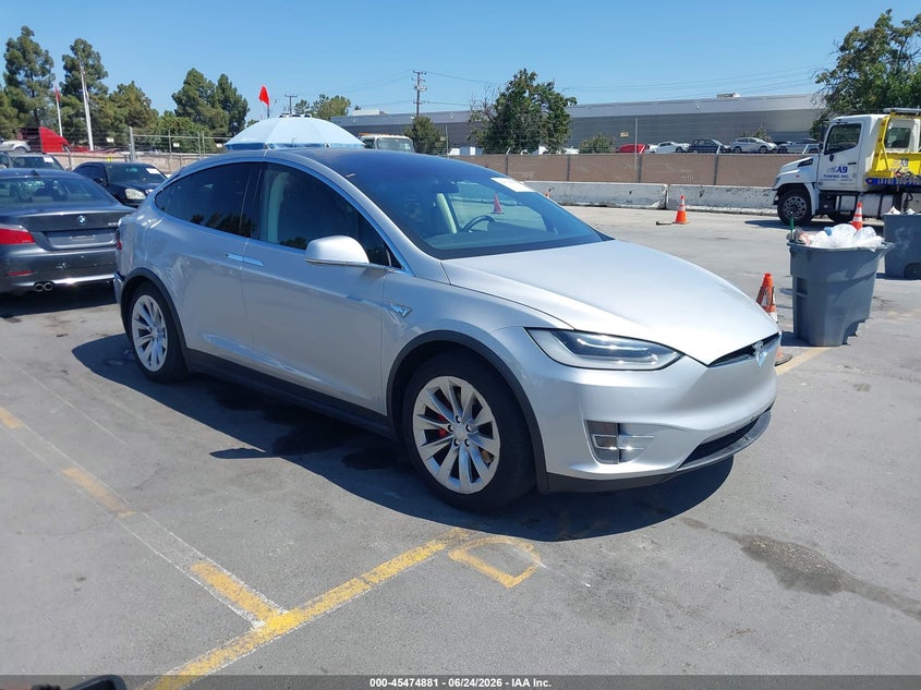 2016 Tesla Model x VIN 5YJXCAE43GF005468 IAAI salvage auction — NORMAL WEAR, Clear - Dealer Only (California), sold $10,025 on 2026-07-06 (photo 1)