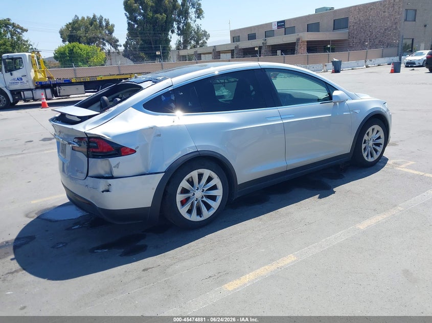 2016 Tesla Model x VIN 5YJXCAE43GF005468 IAAI salvage auction — NORMAL WEAR, Clear - Dealer Only (California), sold $10,025 on 2026-07-06 (photo 4)