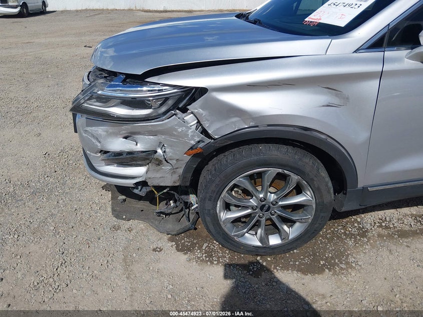 2017 Lincoln Mkc VIN 5LMCJ2D98HUL71032 IAAI salvage auction — ENGINE DAMAGE, Wait Title, sold $200 on 2026-10-02 (photo 6)