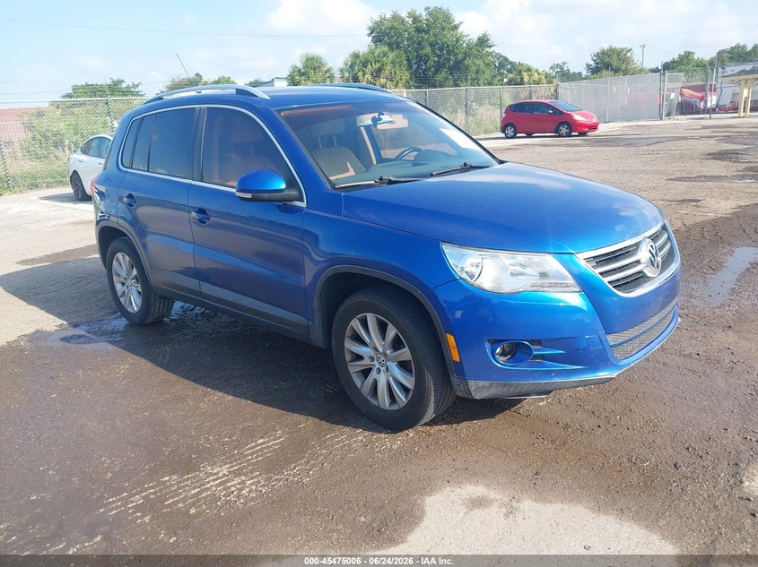 2009 Volkswagen Tiguan VIN WVGAV75NX9W004680 IAAI salvage auction — NORMAL WEAR, Clear (Florida), sold $975 on 2026-07-15 (photo 1)