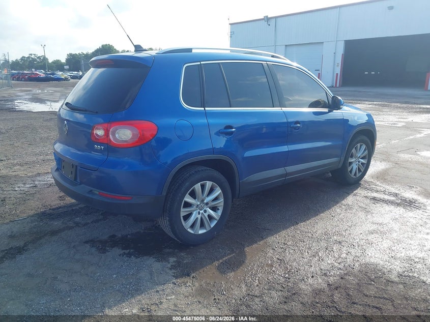 2009 Volkswagen Tiguan VIN WVGAV75NX9W004680 IAAI salvage auction — NORMAL WEAR, Clear (Florida), sold $975 on 2026-07-15 (photo 4)