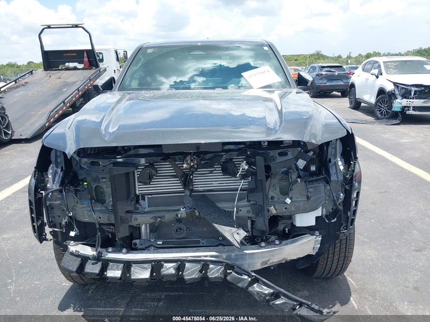 2025 Toyota Tacoma VIN 3TYLC5LN6ST035641 IAAI salvage auction — FRONT END, Salvage Title, sold $15,300 on 2026-07-30 (photo 6)