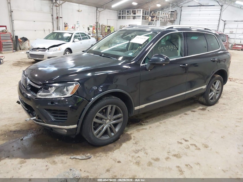 2016 Volkswagen Touareg VIN WVGEF9BP6GD001543 IAAI salvage auction — LEFT FRONT, Wait Title, sold $875 on 2026-07-31 (photo 2)
