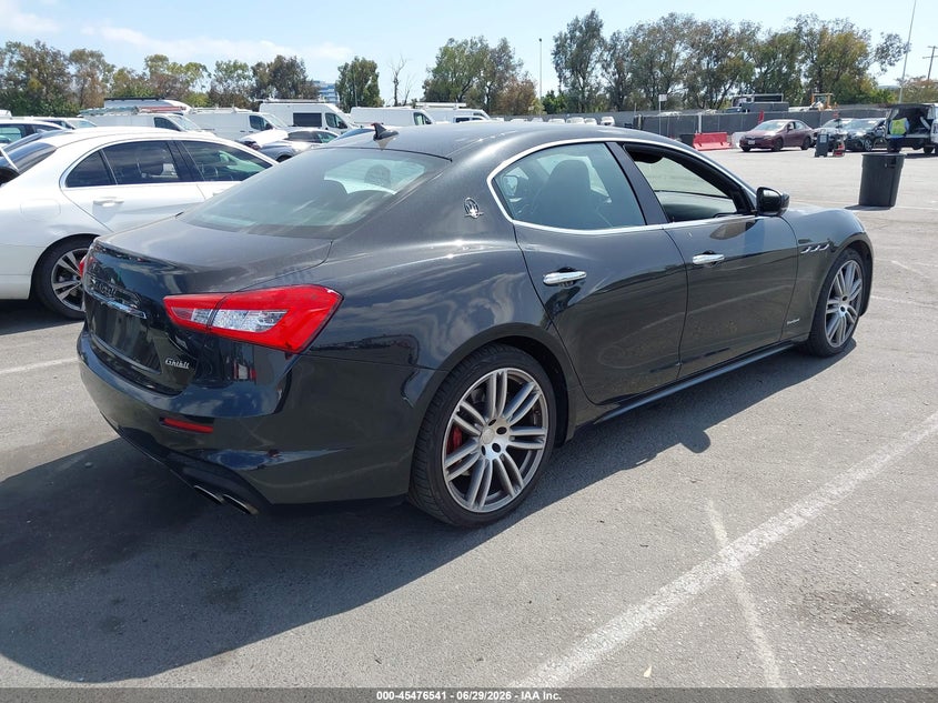 2018 Maserati Ghibli VIN ZAM57YSS9J1260127 IAAI salvage auction — LEFT SIDE, Salvage (Arizona), sold $3,950 on 2026-07-30 (photo 4)