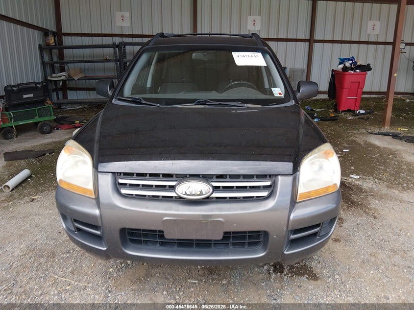 2007 Kia Sportage VIN KNDJF724177447384 IAAI salvage auction — NORMAL WEAR, Clear (Louisiana), sold $725 on 2026-07-06 (photo 6)