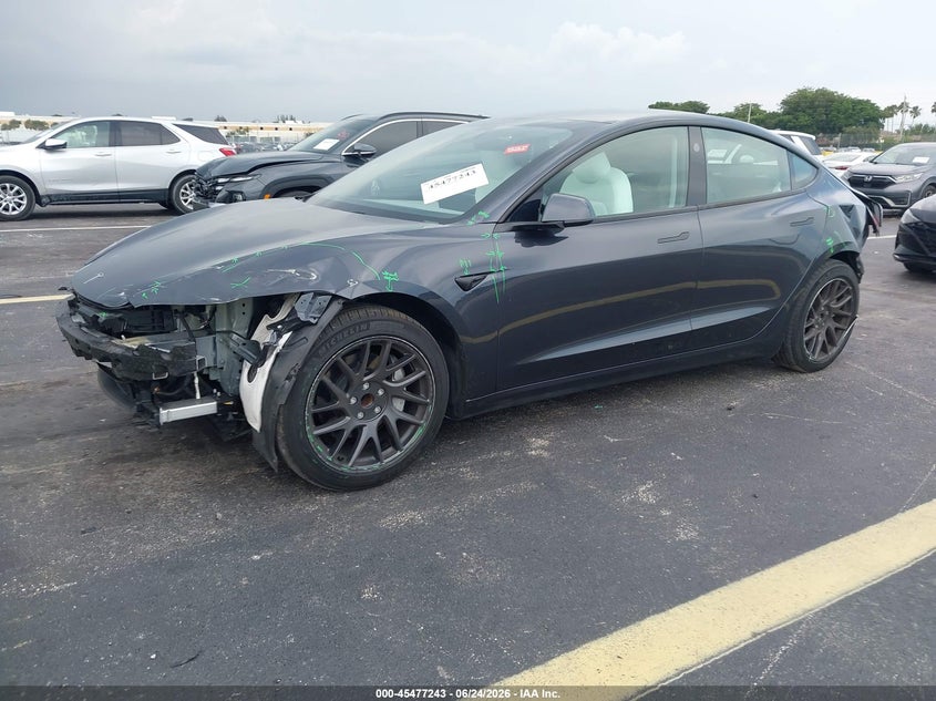 2025 Tesla Model 3 VIN 5YJ3E1EA6SF922041 IAAI salvage auction — FRONT & REAR, Salvage Title, sold $10,600 on 2026-07-30 (photo 2)