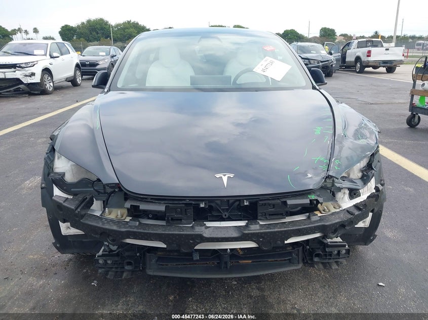 2025 Tesla Model 3 VIN 5YJ3E1EA6SF922041 IAAI salvage auction — FRONT & REAR, Salvage Title, sold $10,600 on 2026-07-30 (photo 6)